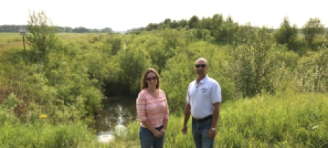 Lake of the Woods SWCD and County staff stand in front of a segment of Judicial Ditch 28 before construction began