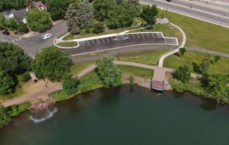 Aerial view of lake's edge and parking lot where underground project was installed