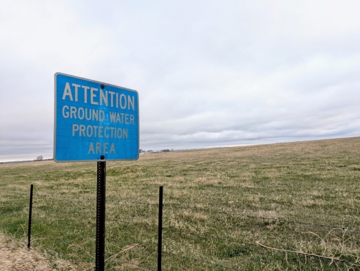 Groundwater Protection Area sign on edge of a farm field